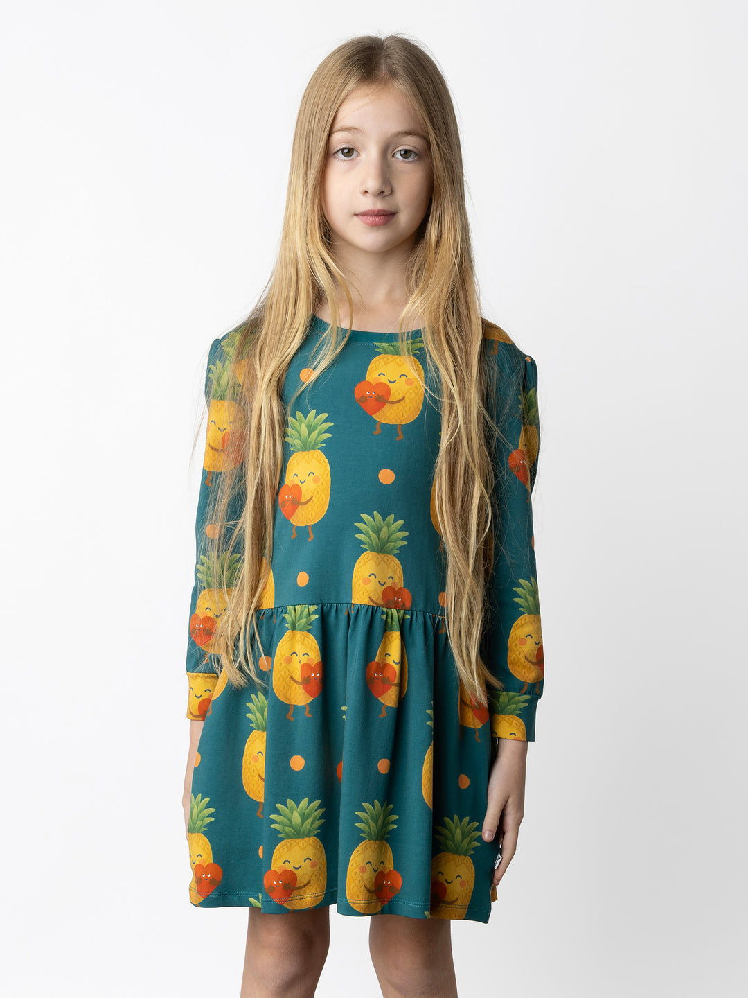 Minti kids clothing. Tshirting weight dress with self cuffs, hidden side pockets and waist seam with ruching detail. 190 Gram // 95% Cotton // 5% Elastane.