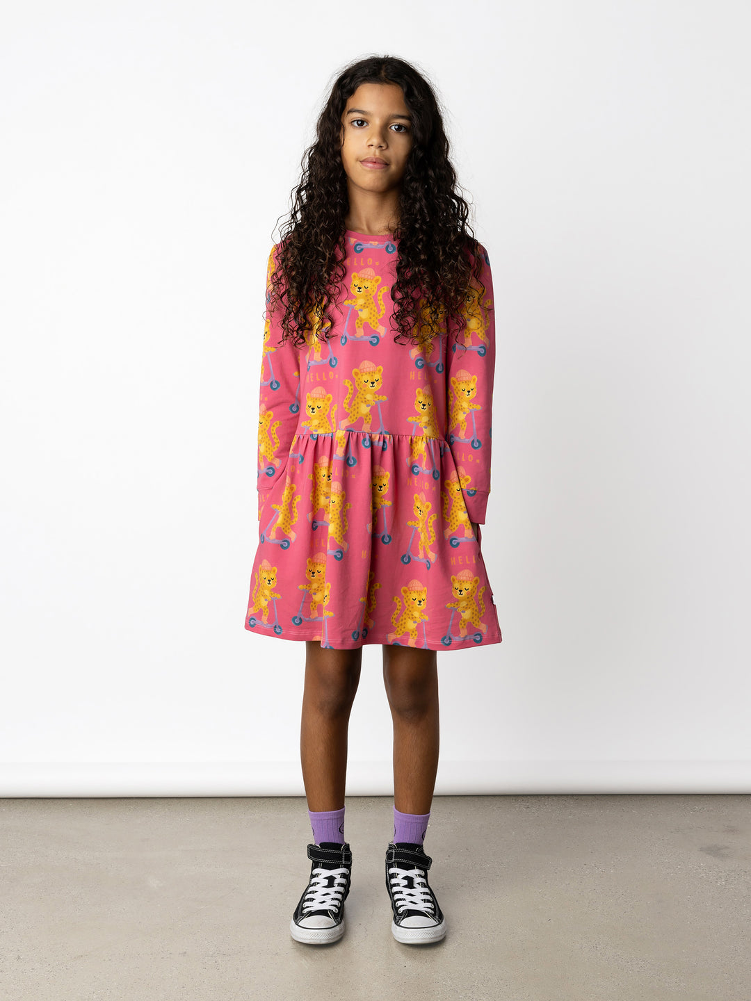 Minti kids clothing. Tshirting weight dress with self cuffs, hidden side pockets and waist seam with ruching detail. 190 Gram // 95% Cotton // 5% Elastane.