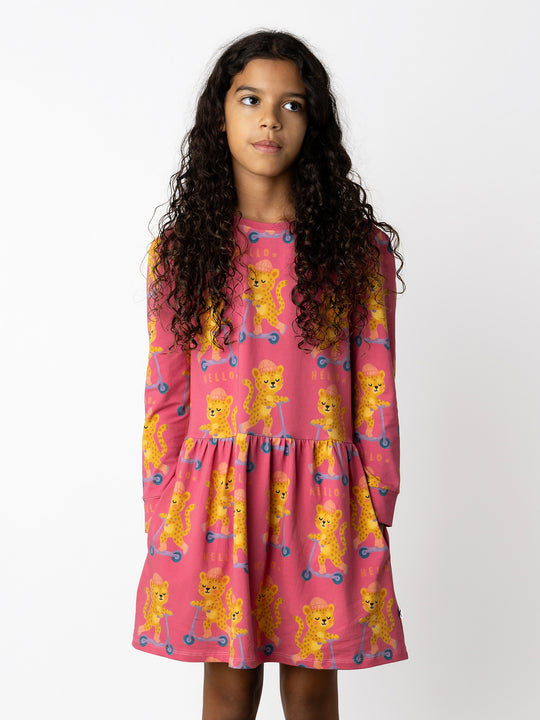 Minti kids clothing. Tshirting weight dress with self cuffs, hidden side pockets and waist seam with ruching detail. 190 Gram // 95% Cotton // 5% Elastane.