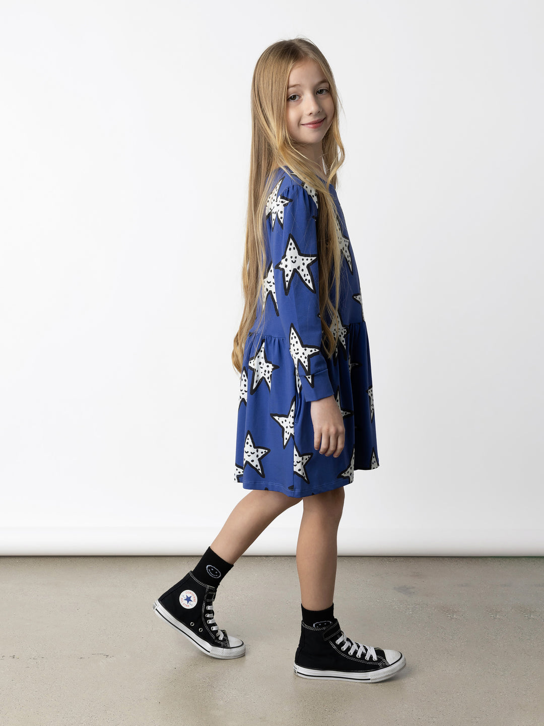 Minti kids clothing. Tshirting weight dress with self cuffs, hidden side pockets and waist seam with ruching detail. 190 Gram // 95% Cotton // 5% Elastane.