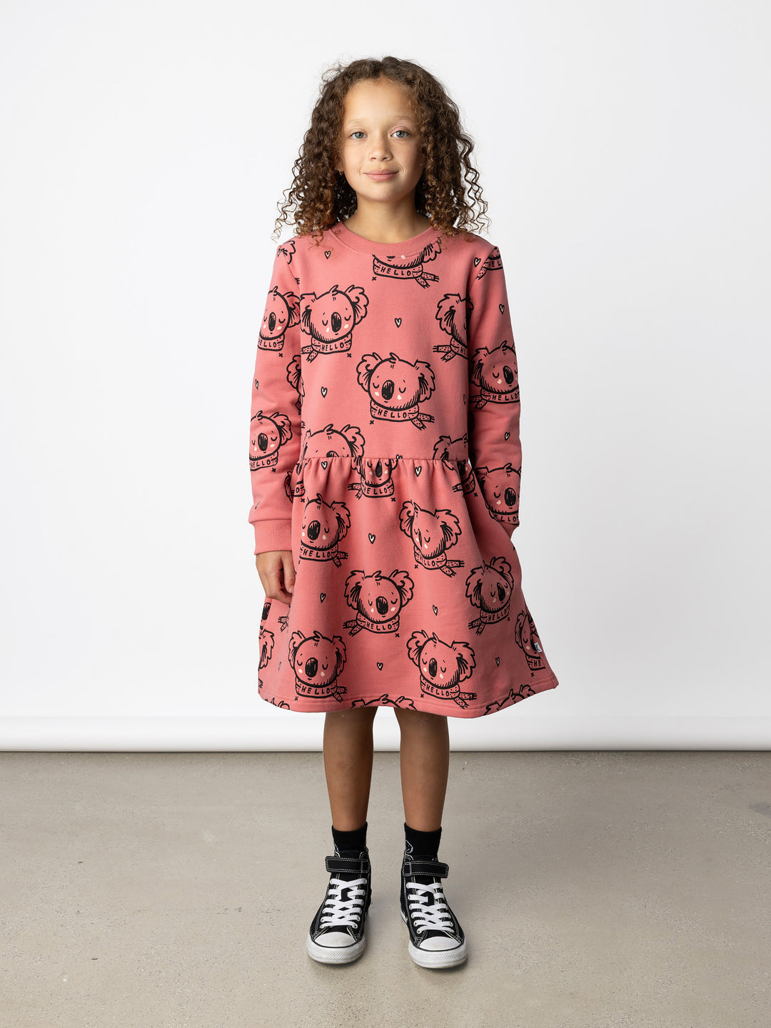 Minti kids clothing. Sweatshirting dress with ruched waist seam and hidden side pockets. 330 Gram // Brushed Inside // 95% Cotton // 5% Elastane.