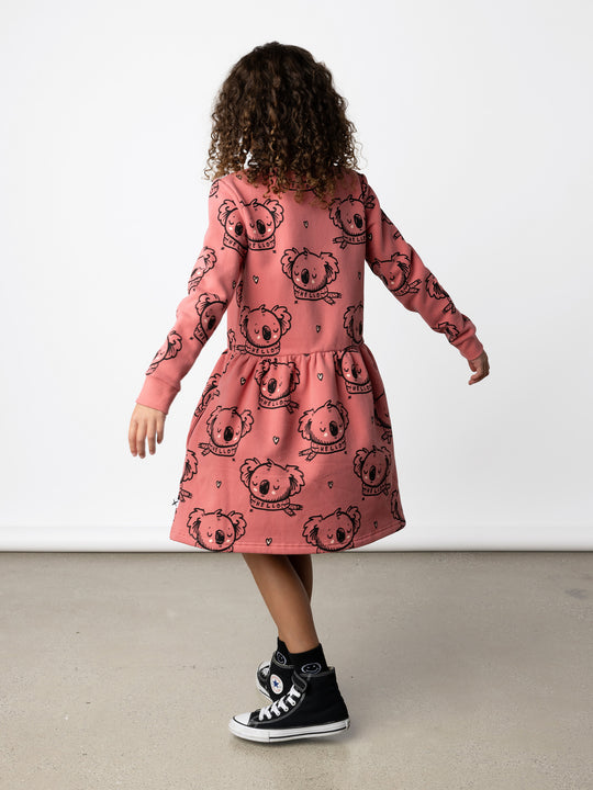 Minti kids clothing. Sweatshirting dress with ruched waist seam and hidden side pockets. 330 Gram // Brushed Inside // 95% Cotton // 5% Elastane.