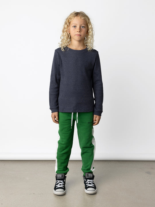 Minti kids clothing. Super cool universal fit Waffle tee with self cuffs, split side seam and slightly longer back hem. 95% Cotton // 5% Elastane.