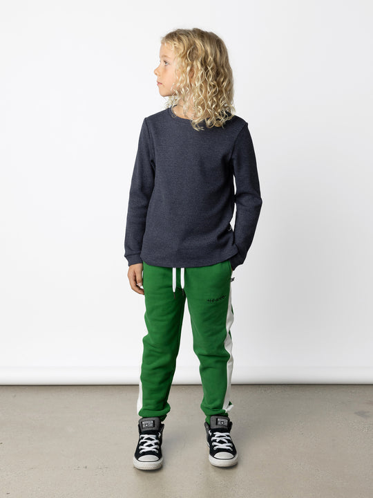 Minti kids clothing. Super cool universal fit Waffle tee with self cuffs, split side seam and slightly longer back hem. 95% Cotton // 5% Elastane.