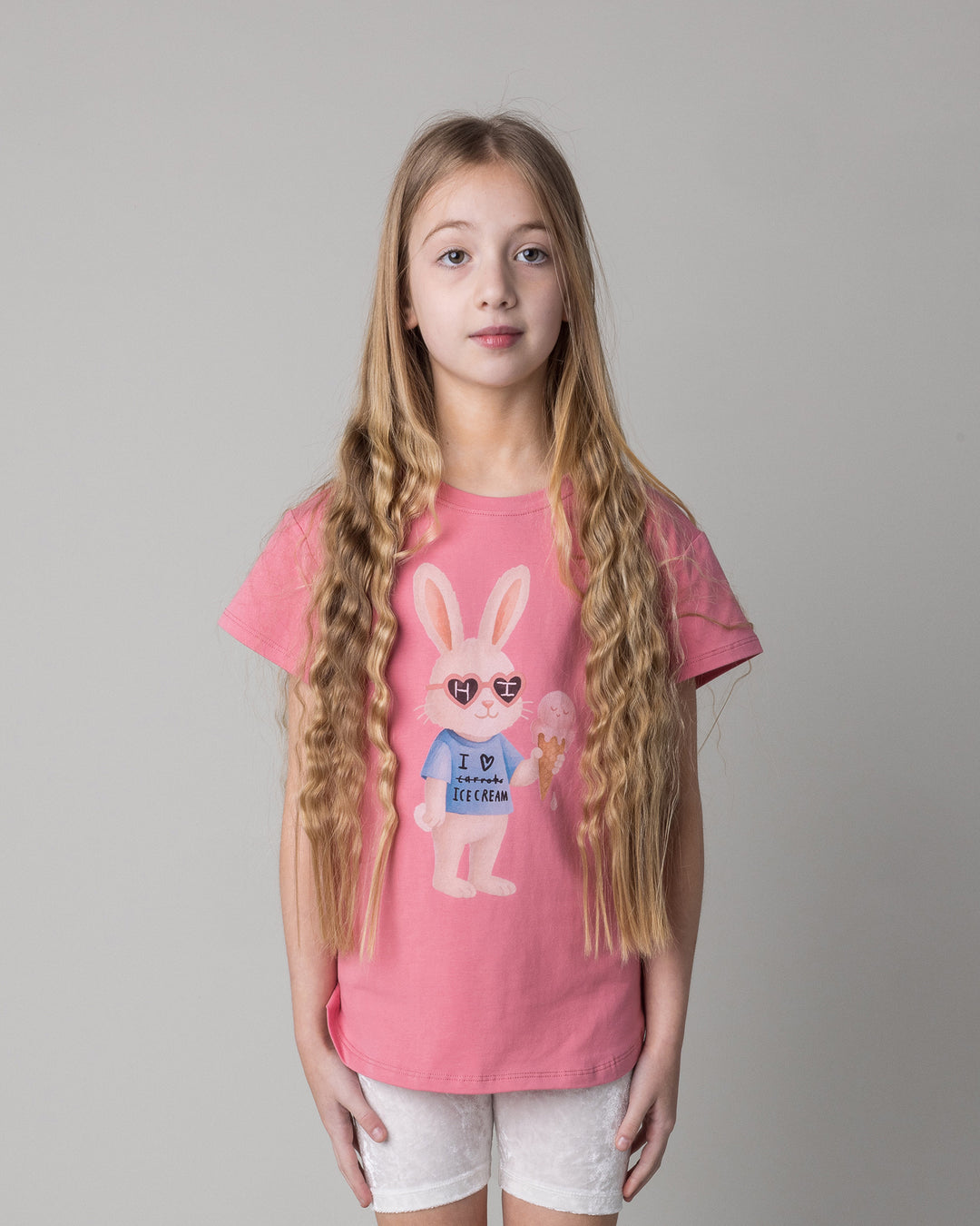 Close up of the Icecream Bunny Tee in candy on a kid, front view