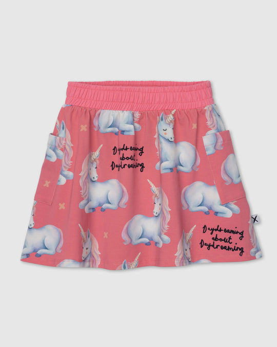 Daydreaming Unicorn Skirt in candy, girls skirt by Minti, flat lay