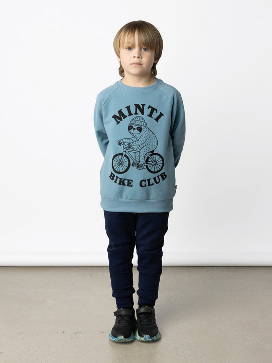 Minti kids clothing. Super cool and comfy crew with hidden side pockets. Perfect for keeping hands warm! 330 Gram // Brushed Inside // 95% Cotton // 5% Elastane.