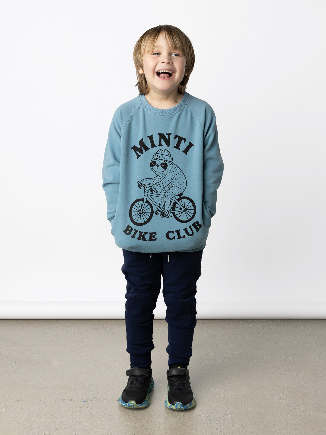 Minti kids clothing. Super cool and comfy crew with hidden side pockets. Perfect for keeping hands warm! 330 Gram // Brushed Inside // 95% Cotton // 5% Elastane.
