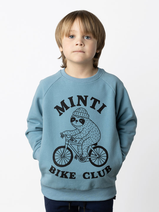 Minti kids clothing. Super cool and comfy crew with hidden side pockets. Perfect for keeping hands warm! 330 Gram // Brushed Inside // 95% Cotton // 5% Elastane.