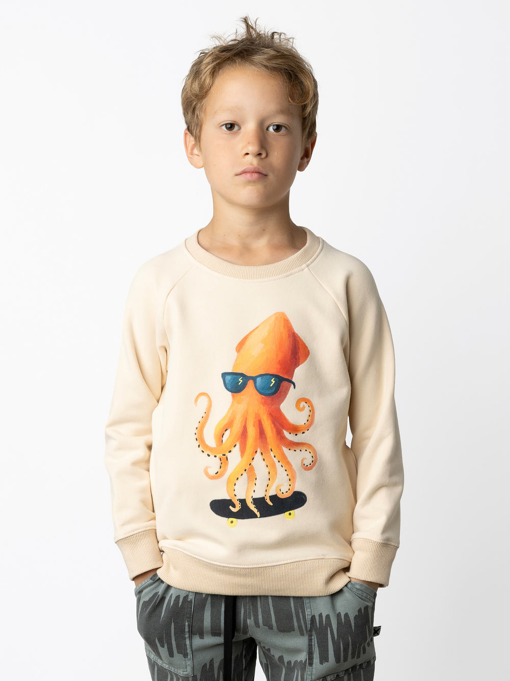 Minti kids clothing. Super cool and comfy crew with hidden side pockets. Perfect for keeping hands warm! 330 Gram // Brushed Inside // 95% Cotton // 5% Elastane.