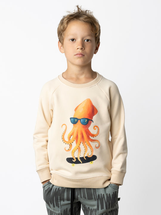 Minti kids clothing. Super cool and comfy crew with hidden side pockets. Perfect for keeping hands warm! 330 Gram // Brushed Inside // 95% Cotton // 5% Elastane.