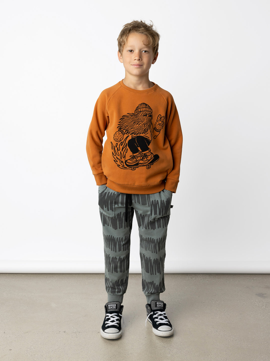 Minti kids clothing. Super cool and comfy crew with hidden side pockets. Perfect for keeping hands warm! 330 Gram // Brushed Inside // 95% Cotton // 5% Elastane.