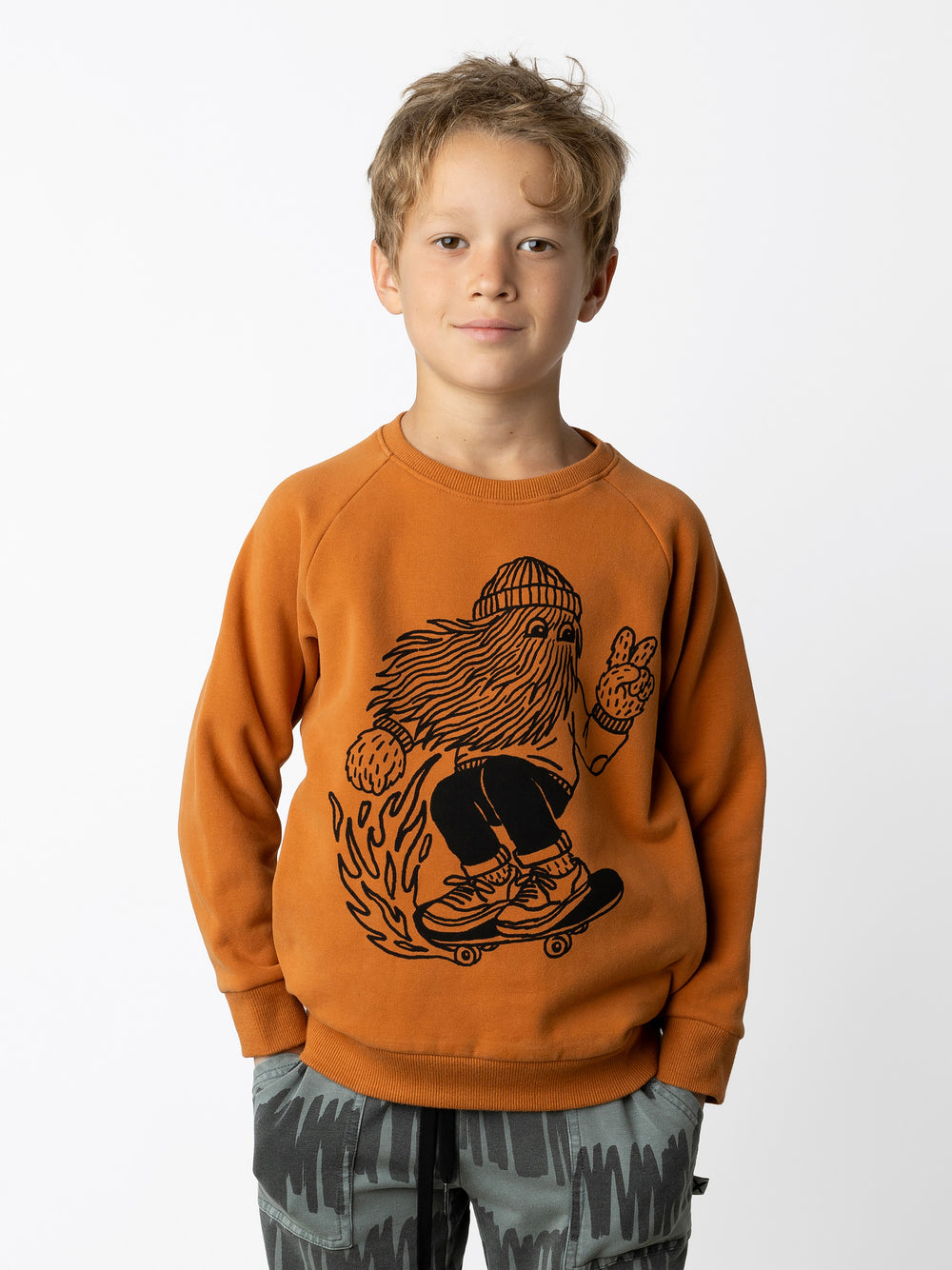 Minti kids clothing. Super cool and comfy crew with hidden side pockets. Perfect for keeping hands warm! 330 Gram // Brushed Inside // 95% Cotton // 5% Elastane.