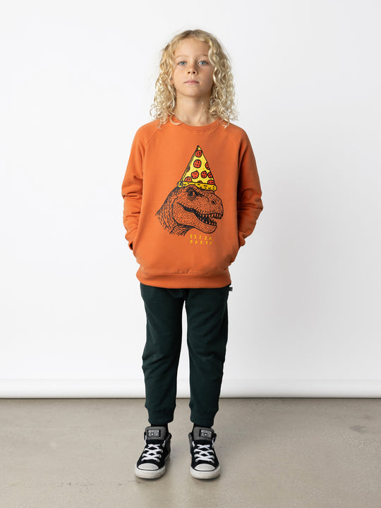 Minti kids clothing. Super cool and comfy crew with hidden side pockets. Perfect for keeping hands warm! 330 Gram // Brushed Inside // 95% Cotton // 5% Elastane.