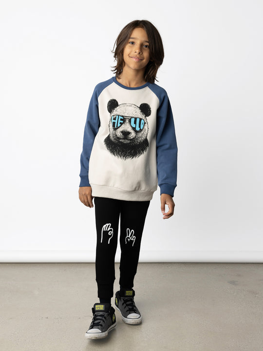Minti kids clothing. Super cool and comfy crew with hidden side pockets. Perfect for keeping hands warm! 330 Gram // Brushed Inside // 95% Cotton // 5% Elastane.