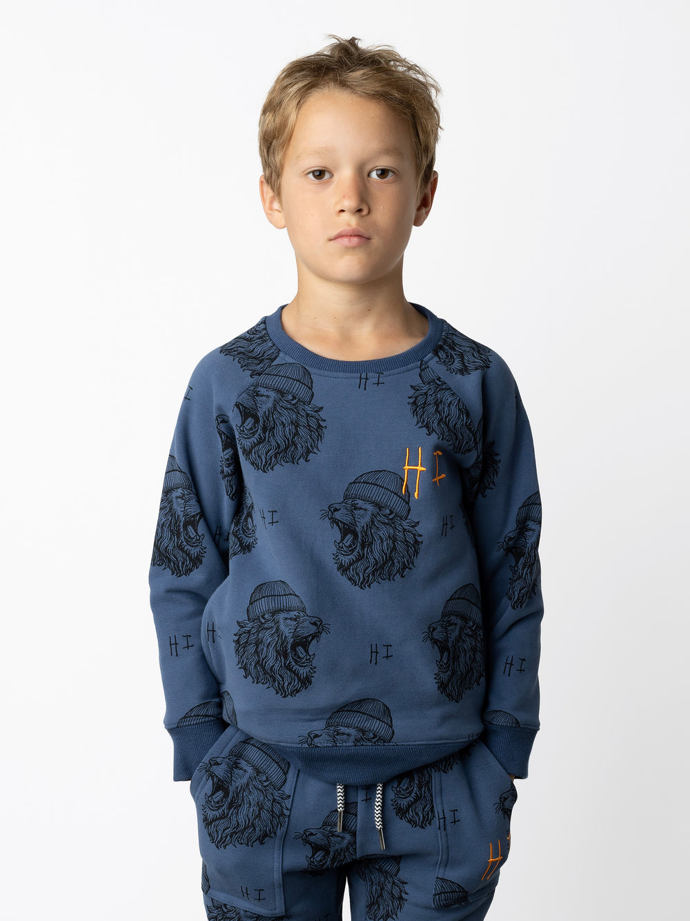 Minti kids clothing. Super cool and comfy crew with hidden side pockets. Perfect for keeping hands warm! 330 Gram // Brushed Inside // 95% Cotton // 5% Elastane.