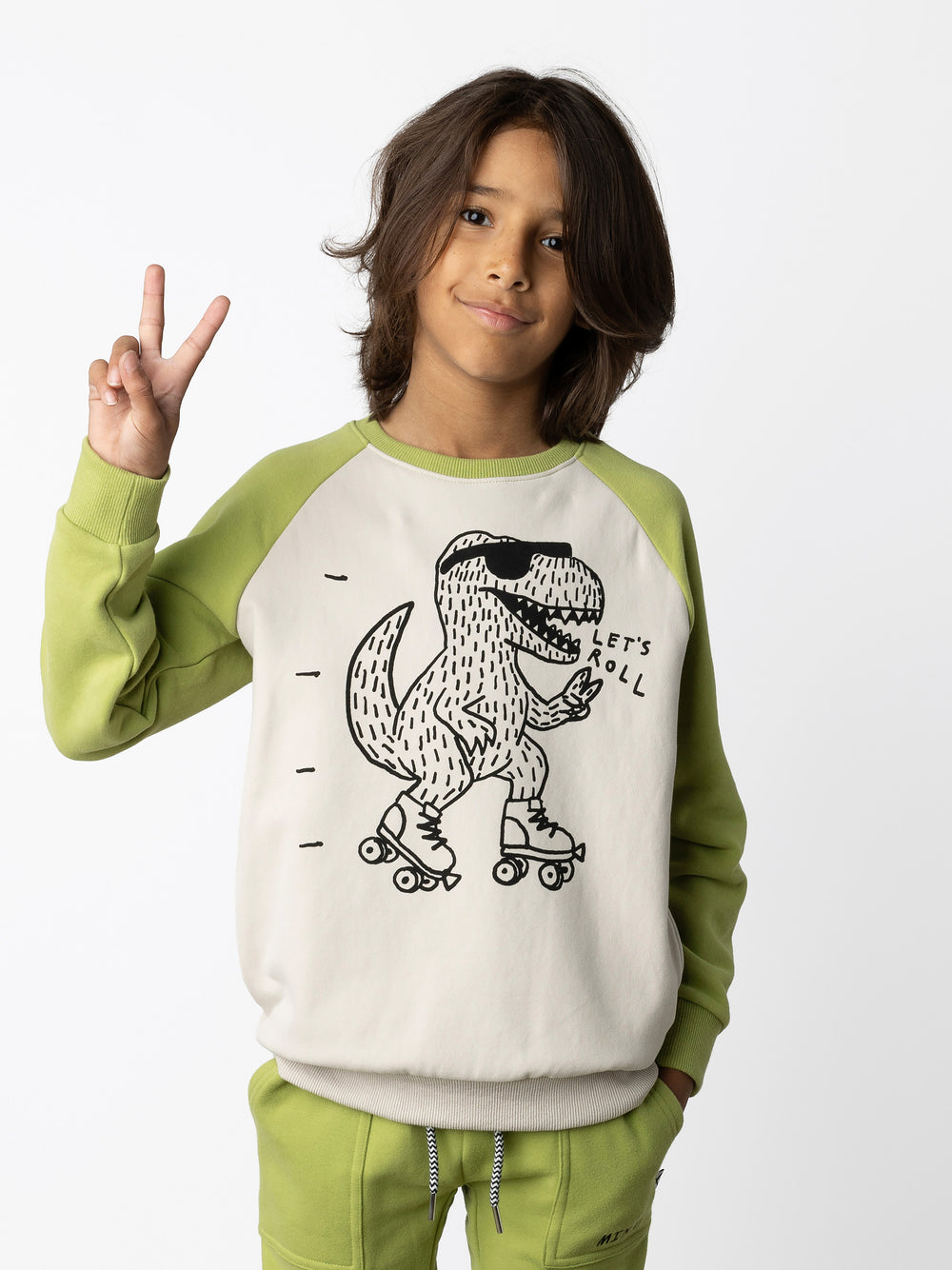 Minti kids clothing. Super cool and comfy crew with hidden side pockets. Perfect for keeping hands warm! 330 Gram // Brushed Inside // 95% Cotton // 5% Elastane.
