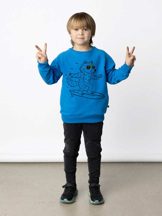 Minti kids clothing. Super cool and comfy crew with hidden side pockets. Perfect for keeping hands warm! 330 Gram // Brushed Inside // 95% Cotton // 5% Elastane.