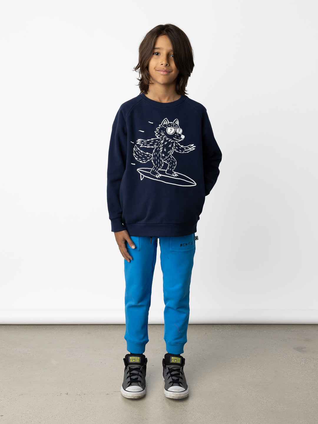 Minti kids clothing. Super cool and comfy crew with hidden side pockets. Perfect for keeping hands warm! 330 Gram // Brushed Inside // 95% Cotton // 5% Elastane.