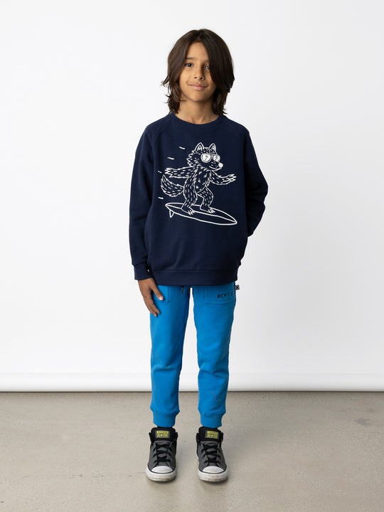 Minti kids clothing. Super cool and comfy crew with hidden side pockets. Perfect for keeping hands warm! 330 Gram // Brushed Inside // 95% Cotton // 5% Elastane.