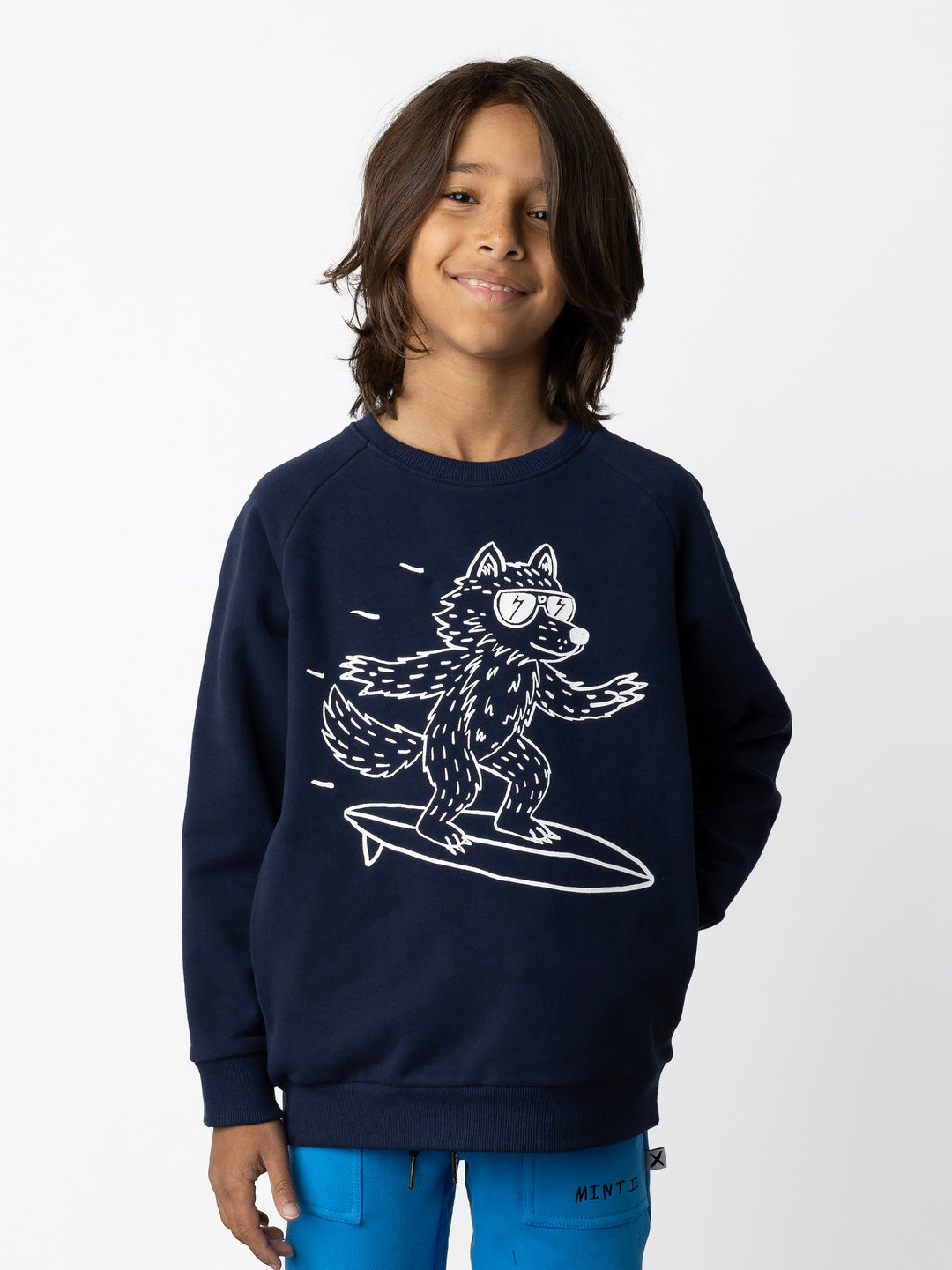 Minti kids clothing. Super cool and comfy crew with hidden side pockets. Perfect for keeping hands warm! 330 Gram // Brushed Inside // 95% Cotton // 5% Elastane.