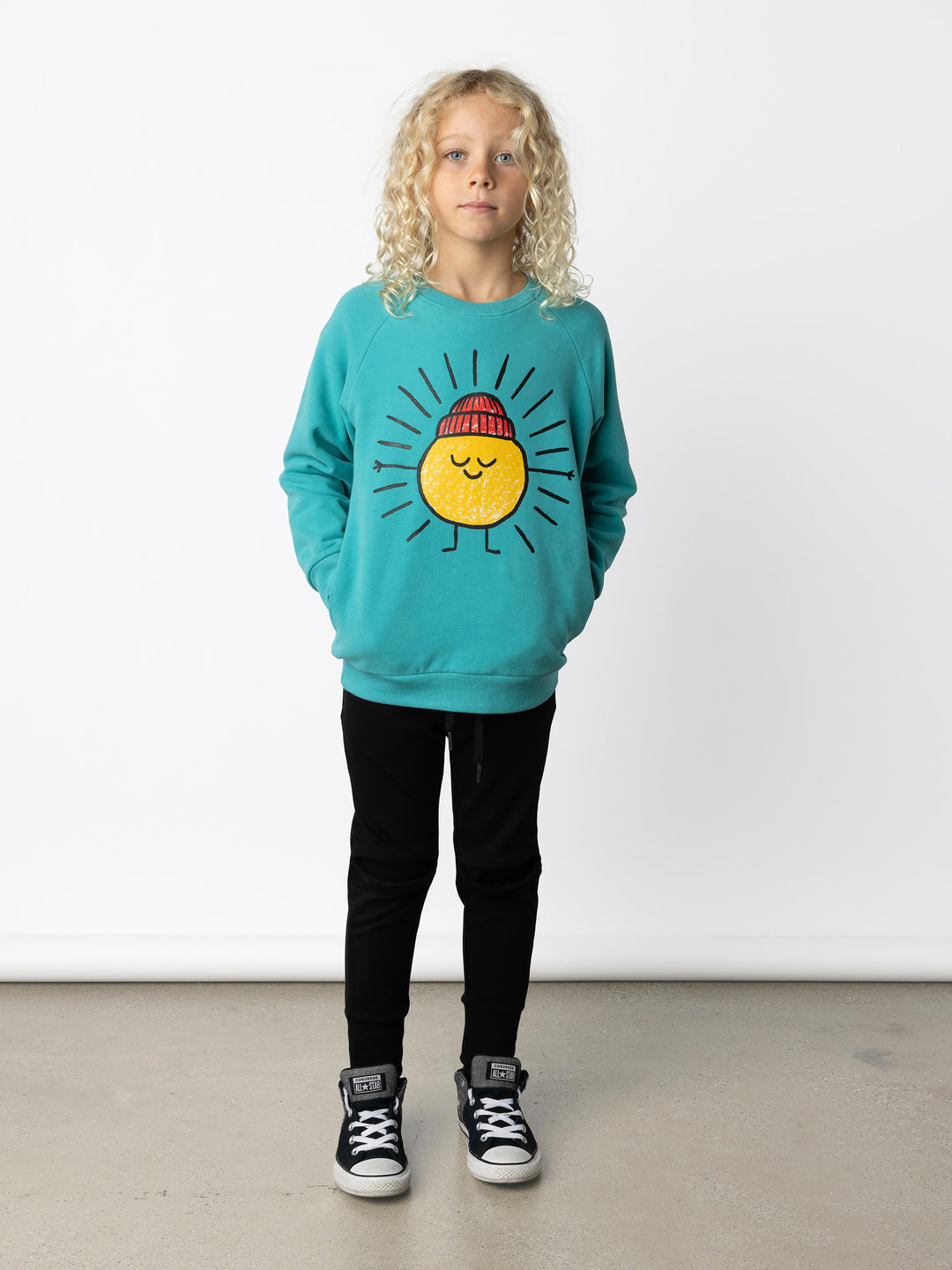 Minti kids clothing. Super cool and comfy crew with hidden side pockets. Perfect for keeping hands warm! 330 Gram // Brushed Inside // 95% Cotton // 5% Elastane.