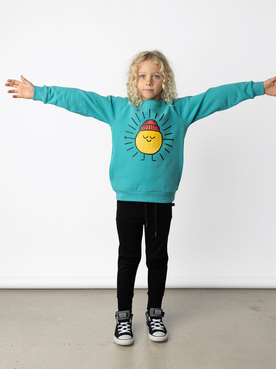 Minti kids clothing. Super cool and comfy crew with hidden side pockets. Perfect for keeping hands warm! 330 Gram // Brushed Inside // 95% Cotton // 5% Elastane.