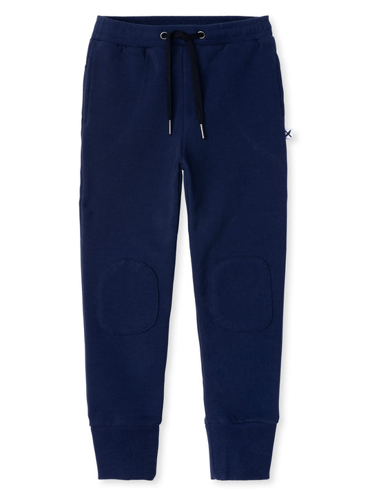 Minti kids clothing. Luxe trackies with sewn on patch knees, front pockets and shoelace ties. Small Minti embroidery on the back. 330 Gram // Brushed Inside // 95% Cotton // 5% Elastane.