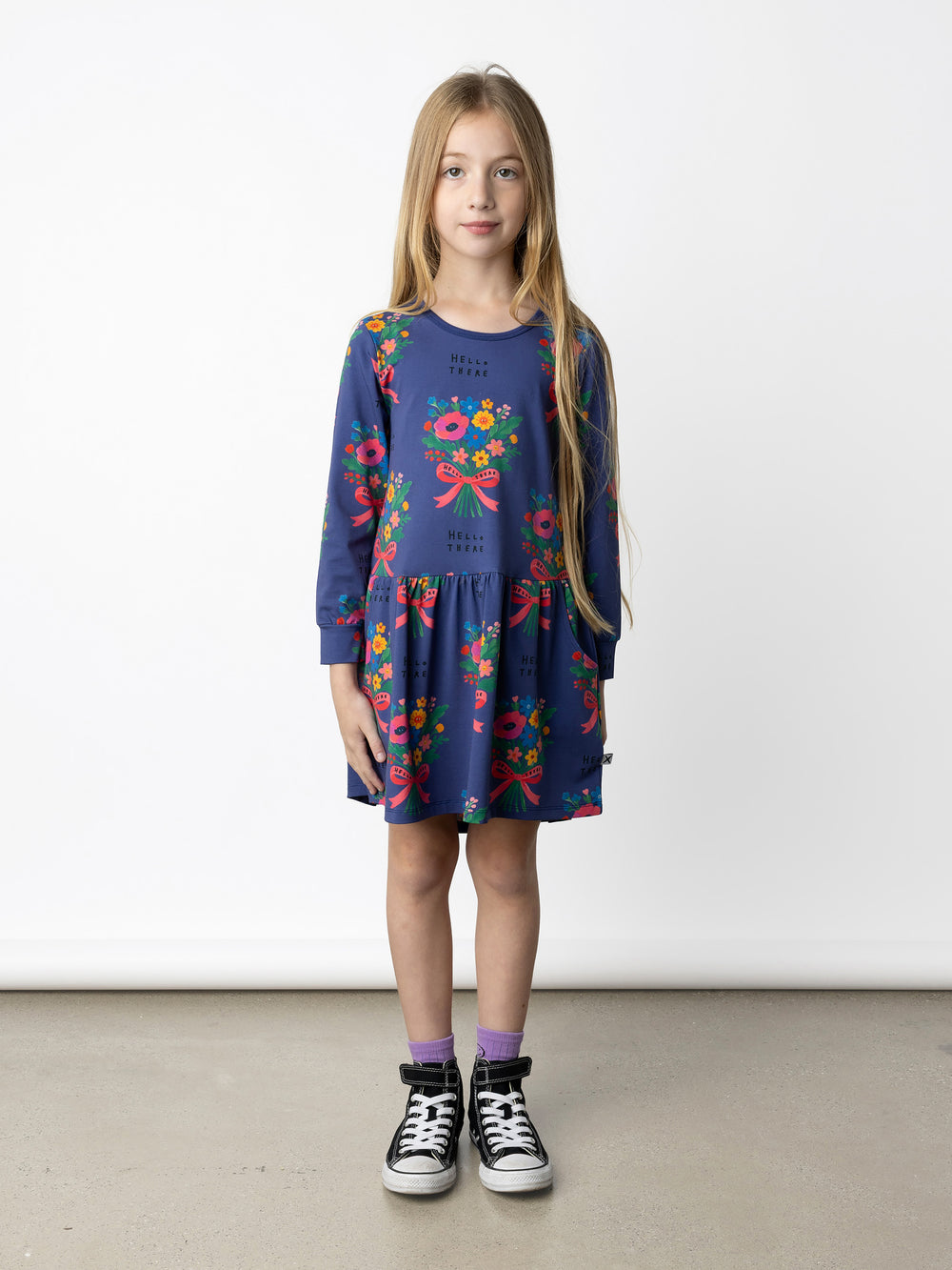 Minti kids clothing. Comfy tshirting weight dress with ruched skirt seam, front pockets and scooped back hem. 190 Gram // 95% Cotton // 5% Elastane.