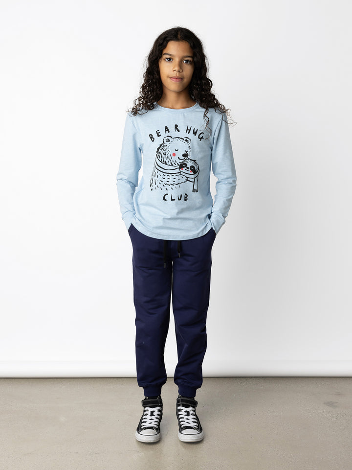 Minti kids clothing. Comfy tee with self cuffs and curved front and back hem. 180 Gram // 95% Cotton // 5% Elastane.