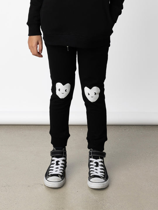 Minti kids clothing. Slim leg trackies with front pockets, shoelace cord and 2x2 rib waistband and cuffs. 330 Gram // Brushed Inside // 95% Cotton // 5% Elastane.