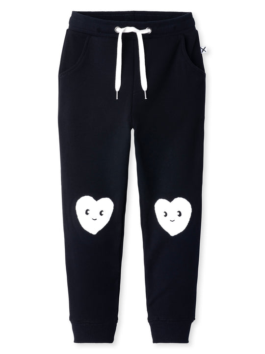 Minti kids clothing. Slim leg trackies with front pockets, shoelace cord and 2x2 rib waistband and cuffs. 330 Gram // Brushed Inside // 95% Cotton // 5% Elastane.