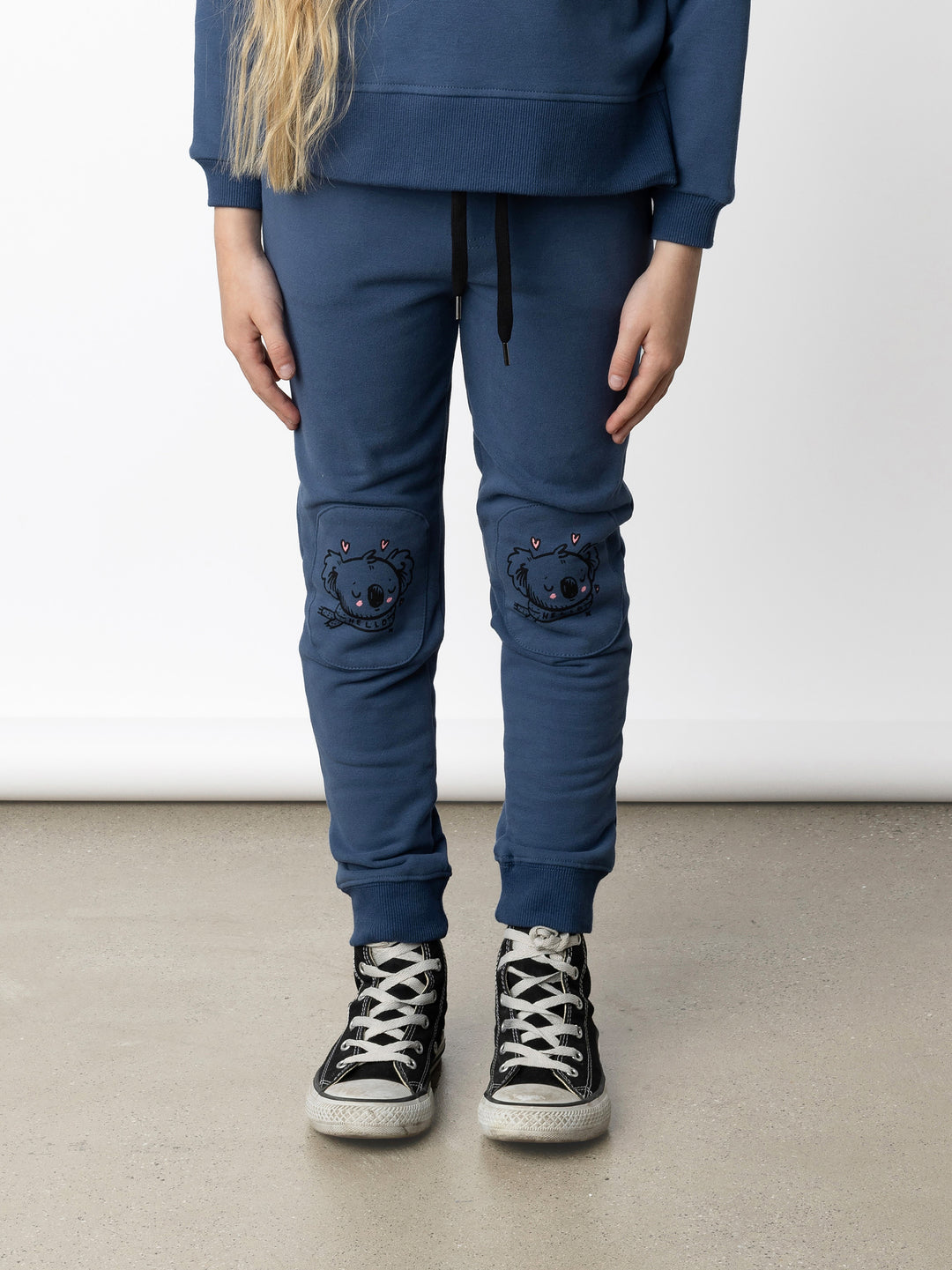 Minti kids clothing. Slim leg trackies with front pockets, shoelace cord and 2x2 rib waistband and cuffs. We recommend to go up a size for this style. 330 Gram // Brushed Inside // 95% Cotton // 5% Elastane.