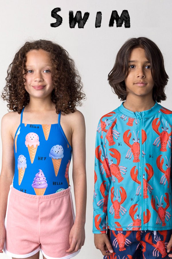 Shop kids swim at Minti, kids wearing the Happy Icecreams Swimsuit and Vacay Crayfish Rashie